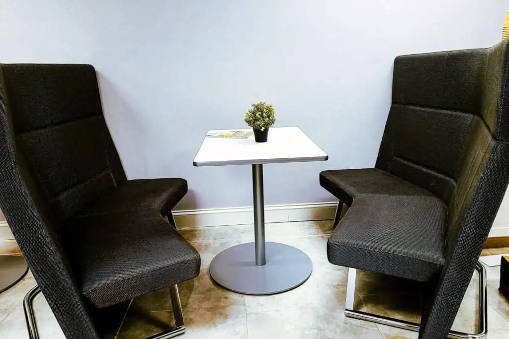 two comfortable booth seats and table at arlington heights coworking